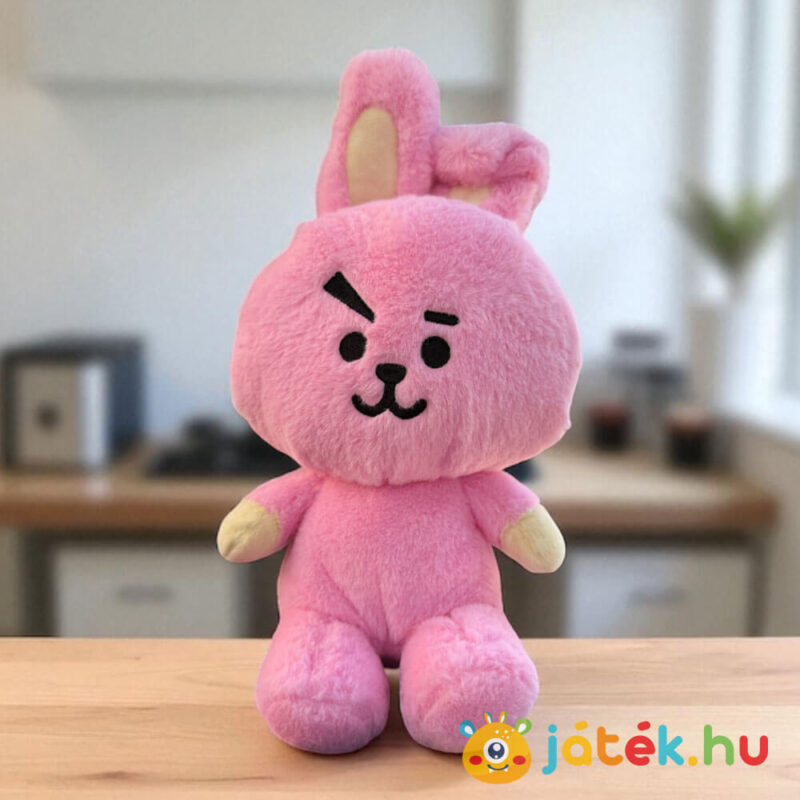 BT21: Cooky, a rózsaszín plüss nyúl, 26 cm, Jungkook karaktere az asztalon
